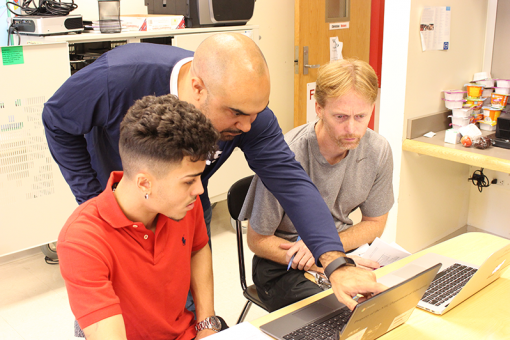Two teachers coach one student
